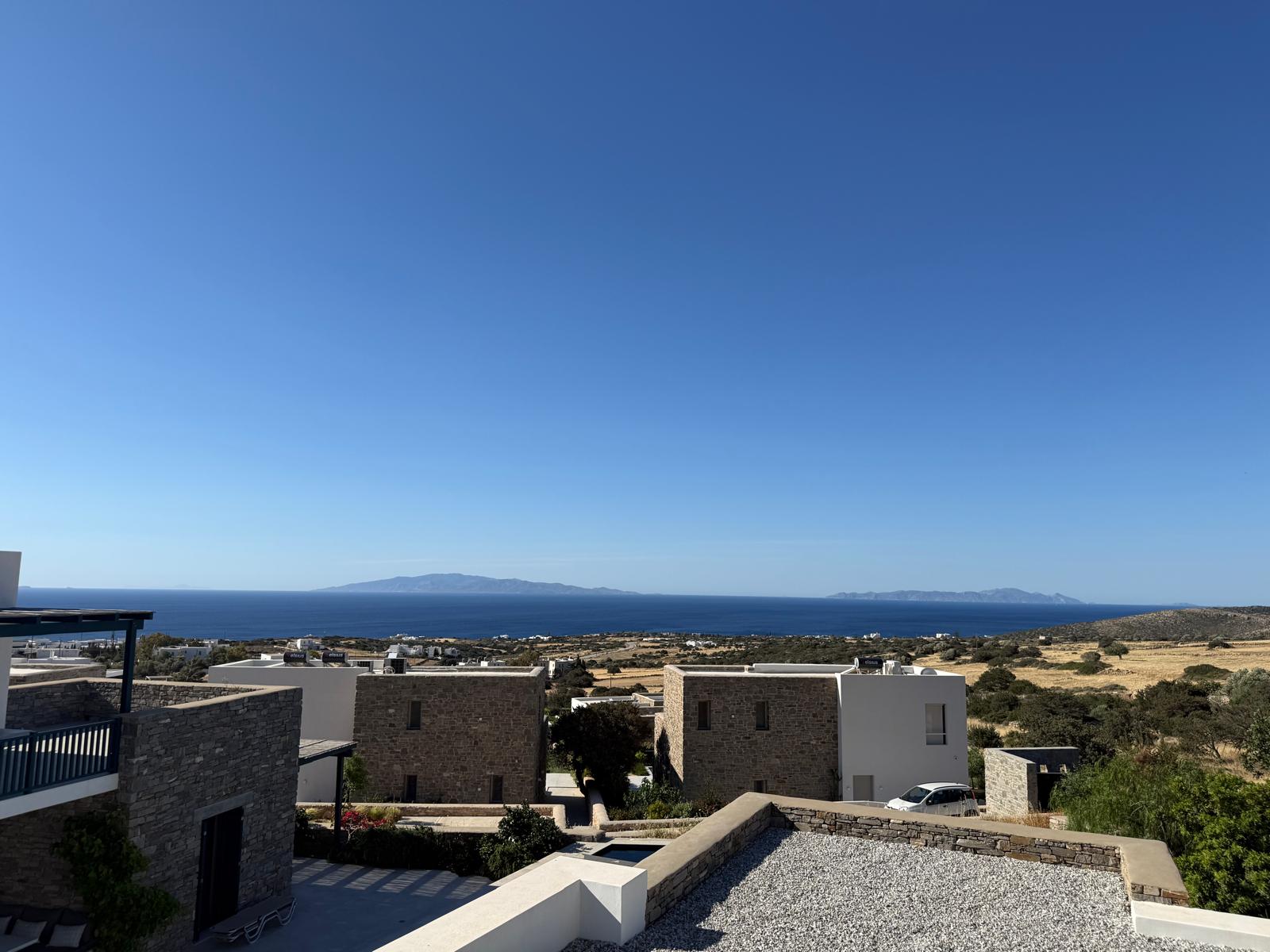The Panorama Sky Suite — shaded veranda with Aegean Sea view